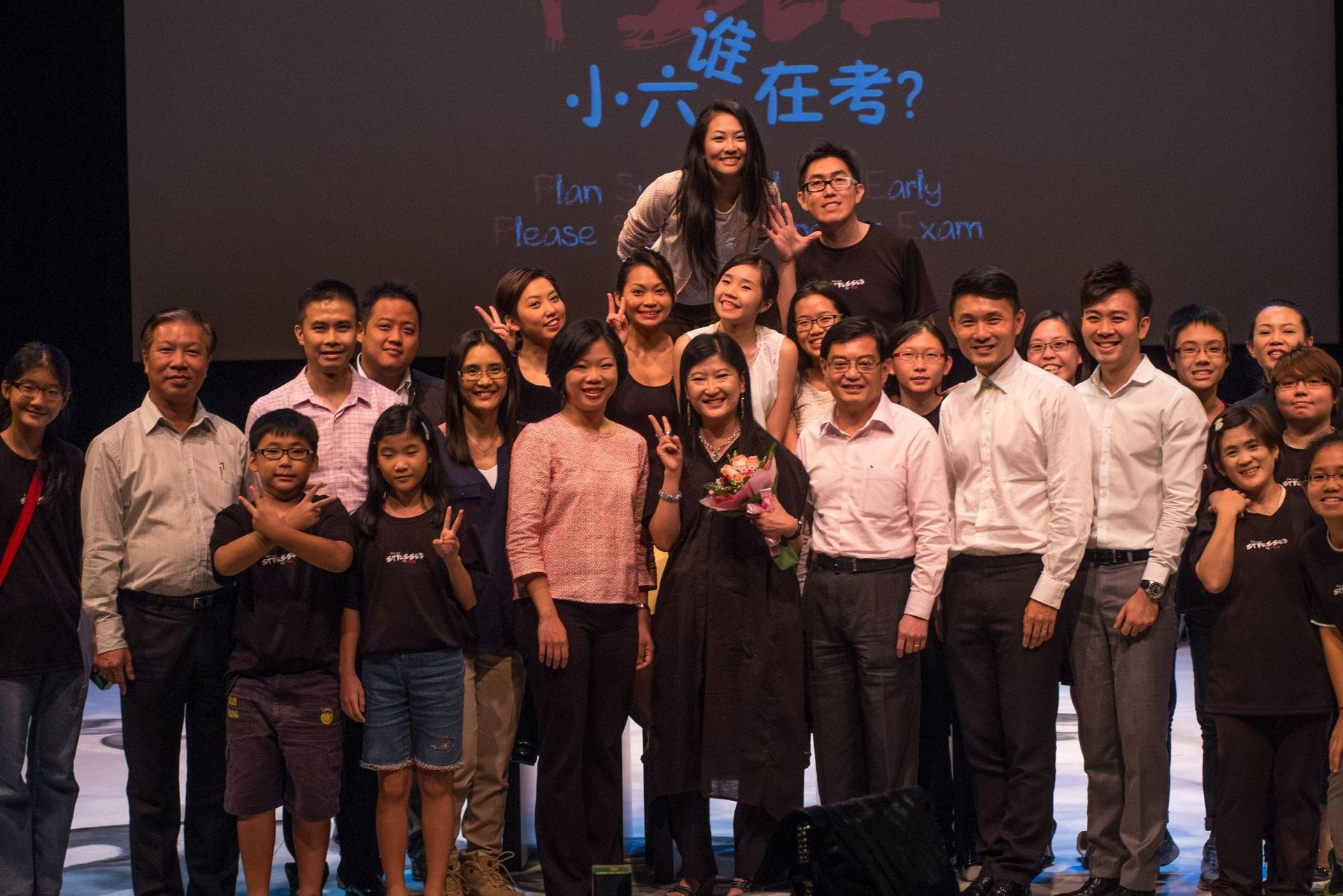 Group photo with the ministers who attended the theatre show "PSLE" which Mr Bottle was part of.