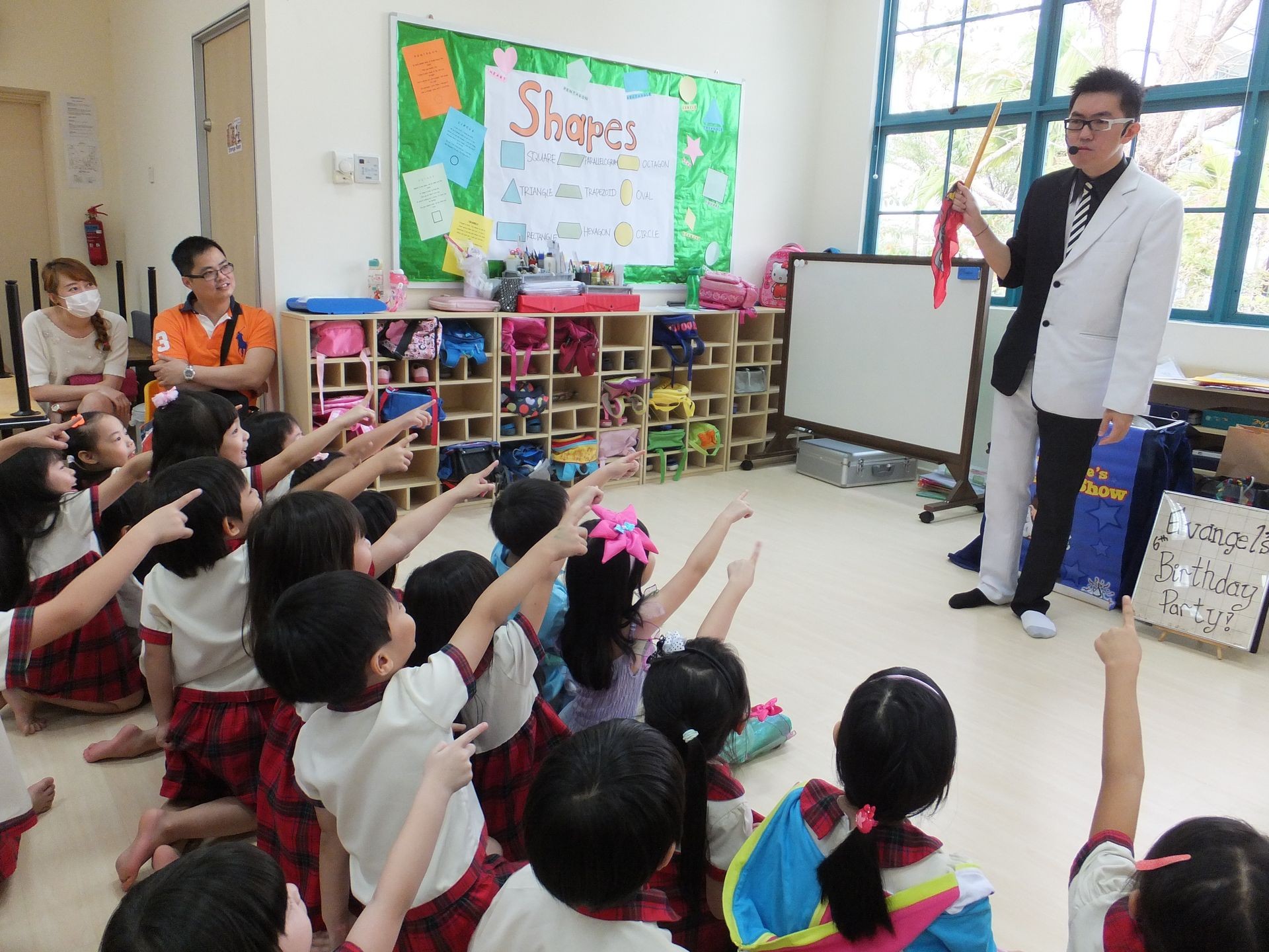 children interacting with Mr Bottle